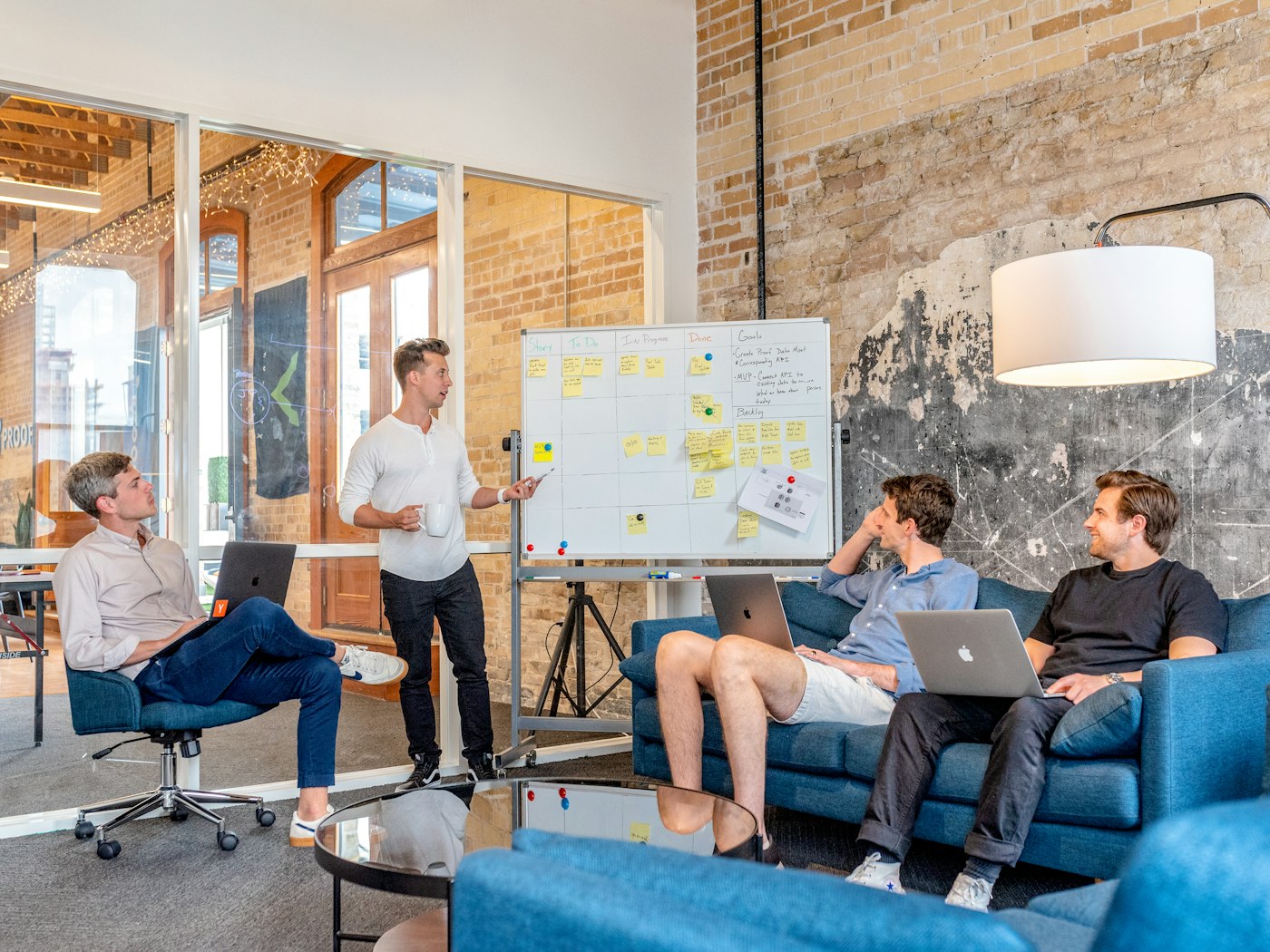 A campaign pitch presented to a client leadership team in a conference room